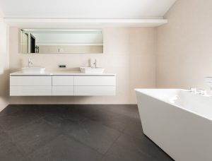 Modern bathroom design with quartz vanity and neutral wall finishes