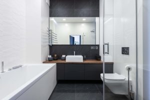 Black and white bathroom tile installation in Charlotte NC contemporary home remodel