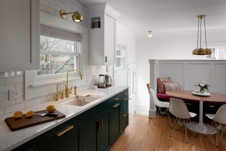 Super white kitchen countertop with gold fixtures and modern design