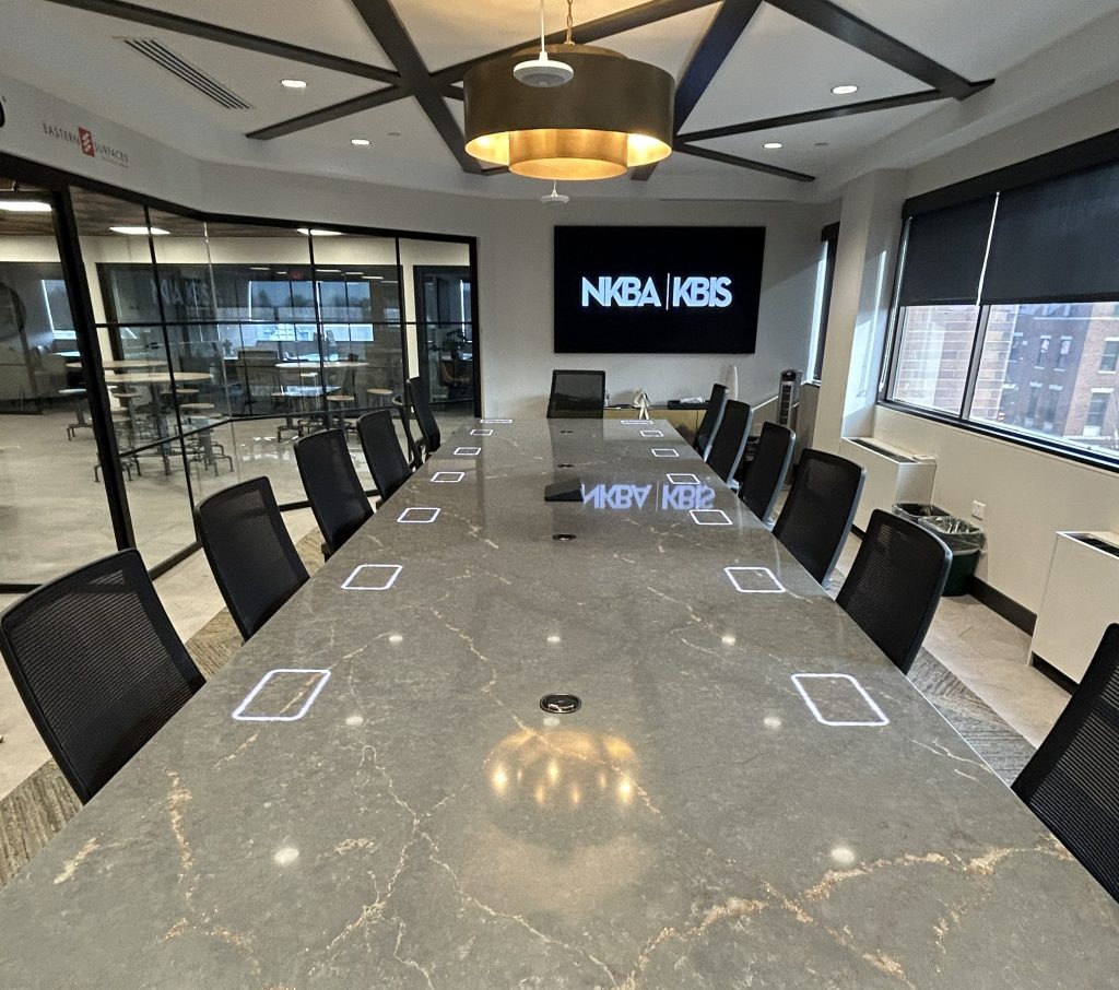 Conference Table Featuring Advanced Wireless Charging Technology.