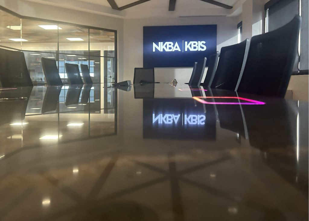 Modern office interior with black shiny conference table
